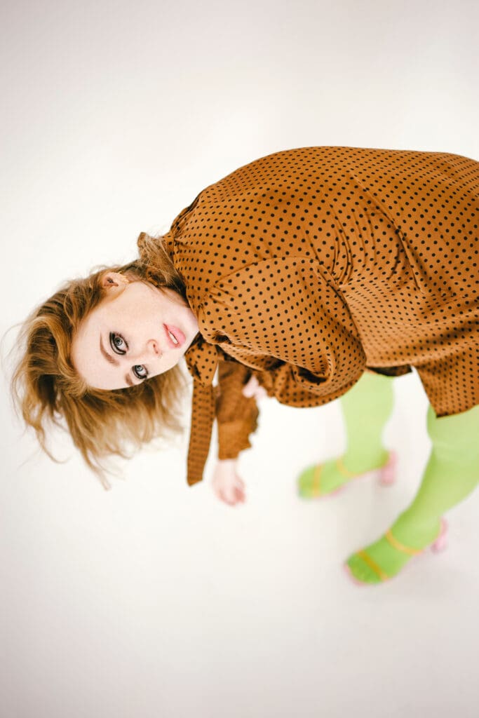 Los Angeles wedding photographer Abigail Gorden studio portrait in polka dots and tights.