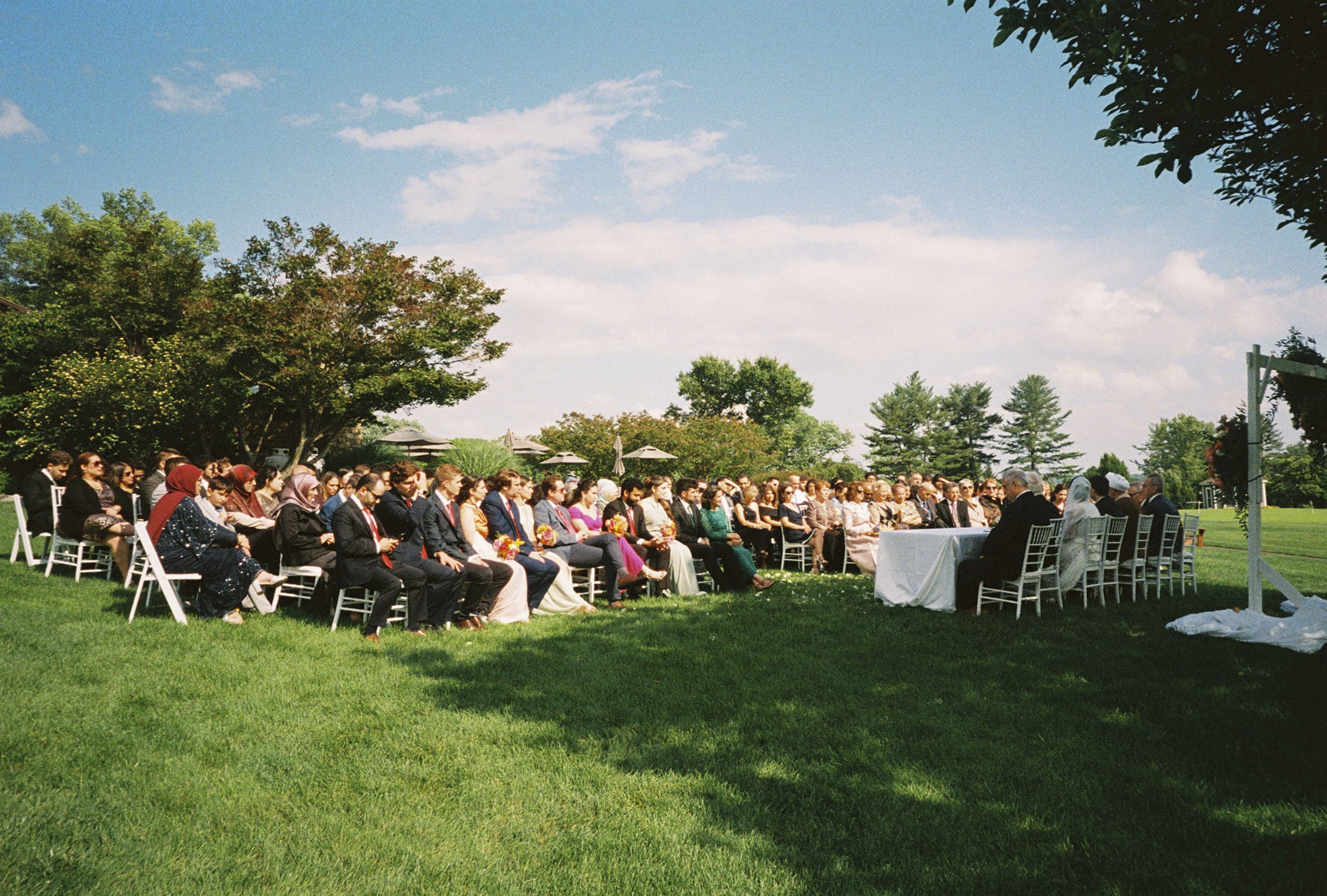 Vivid 35mm film shot of couple’s wedding ceremony in Germantown, MD.
