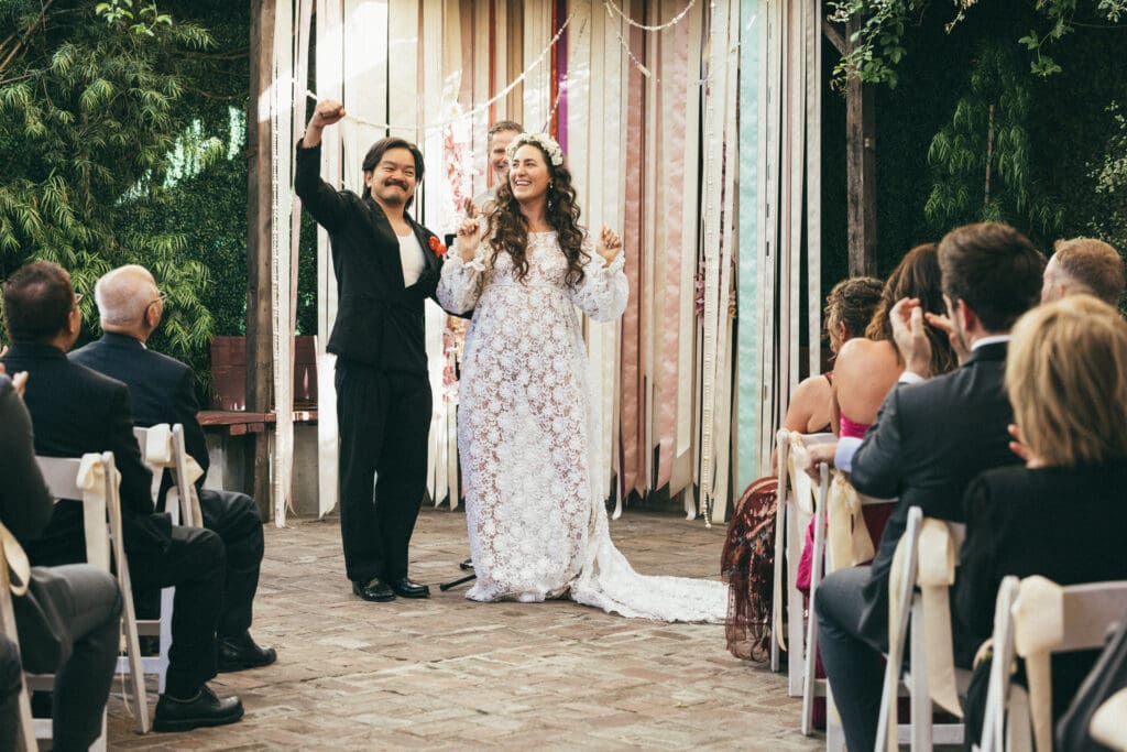Happy bride and groom after officially tying the knot at Seventh/Place in the Arts District in Downtown, LA.